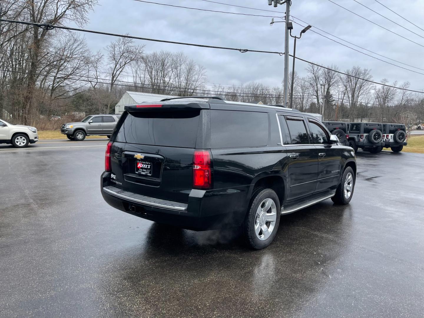 2016 Black /Brown Chevrolet Suburban LTZ 4WD (1GNSKJKC3GR) with an 5.3L V8 OHV 16V engine, 6A transmission, located at 11115 Chardon Rd. , Chardon, OH, 44024, (440) 214-9705, 41.580246, -81.241943 - Photo#9